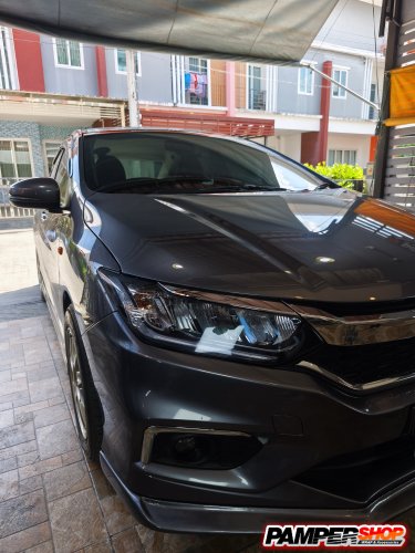 Honda City หุ้มฟิล์มไฟหน้า ( เกรด TPH ) สีฟ้าอ่อน Hybrid